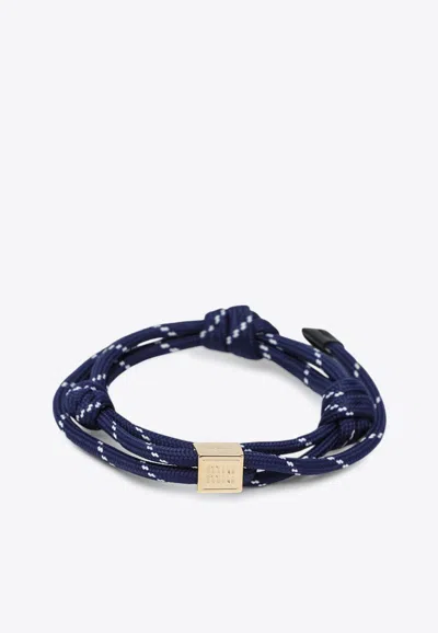 Miu Miu Logo Engraved Charm Cord Bracelet In Blue