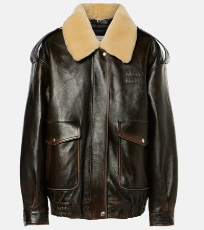MIU MIU LOGO FAUX SHEARLING-TRIMMED LEATHER JACKET