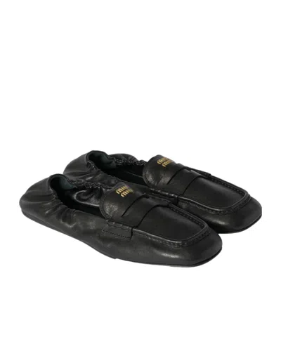Miu Miu Logo Flats In Black