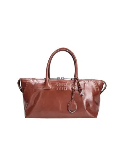 Miu Miu Logo Handbag In Brown