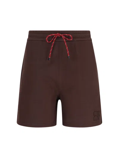 Miu Miu Logo Jogger Shorts In Brown