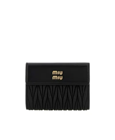 Miu Miu Logo-lettering Matelassé Wallet In Black