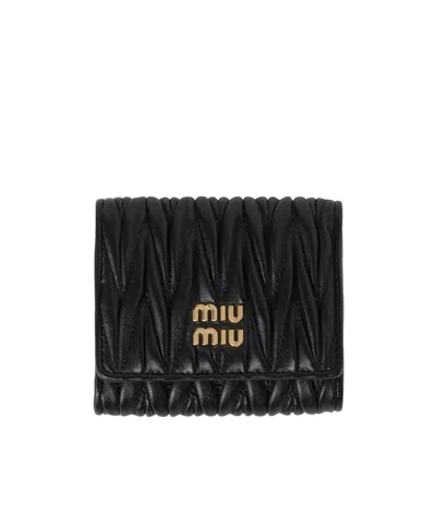 Miu Miu Logo-lettering Matelassé Wallet In Black