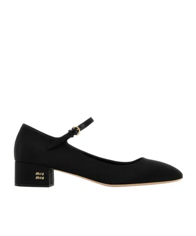 Miu Miu Logo-lettering Pumps In Black
