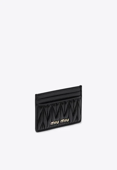 Miu Miu Logo Lettering Quilted Leather Cardholder In Black