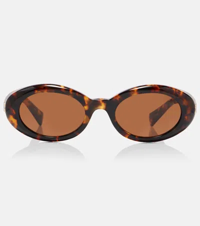 Miu Miu Logo Oval Sunglasses In Brown