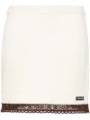 Miu Miu Logo-patch Crochet Miniskirt In Neutrals