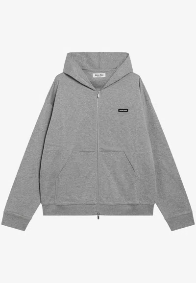 Miu Miu Logo Patch Zip-up Hooded Sweatshirt In Gray