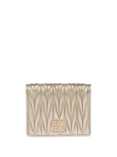 Miu Miu Logo-plaque Matelassé Wallet In Gold
