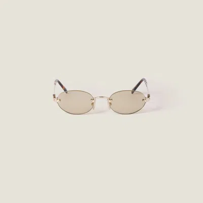 Miu Miu Logo Sunglasses In Gold