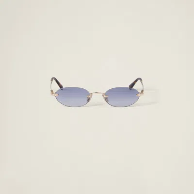 Miu Miu Logo Sunglasses In Indigo Lenses