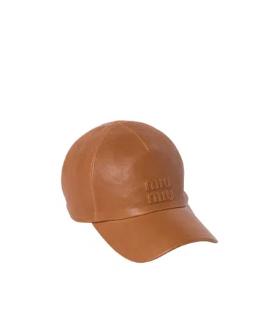 Miu Miu Logo-debossed Curved Peak Baseball Cap In Brown