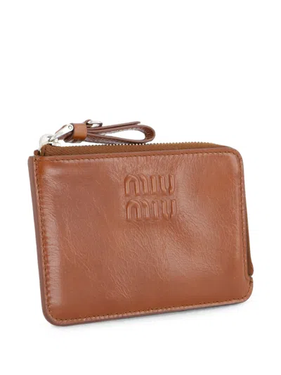 Miu Miu Logo-embossed Leather Clutch Bag In Brown