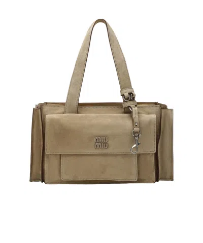 Miu Miu Logo-plaque Pocket Tote Bag In Brown