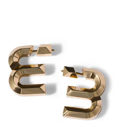 Miu Miu M Logo Stud Earrings In Metallic