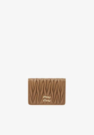 Miu Miu Matelassé Leather Logo Cardholder In Caramel