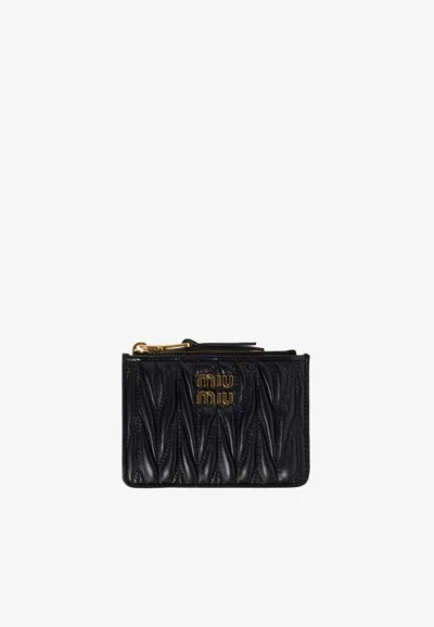 Miu Miu Matelassé Leather Logo Zip Cardholder In Black