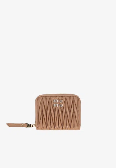 Miu Miu Matelassé Leather Logo Zip Wallet In Brown