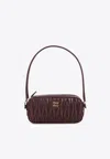 Miu Miu Lamb Leather Quilted Pouch And Strap In Burgundy