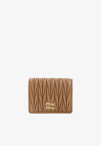 Miu Miu Matelassé Leather Wallet In Brown