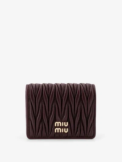 MIU MIU MATELASSÉ LEATHER WALLET WITH METAL LOGO