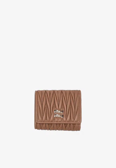 Miu Miu Matelassé Logo Wallet In Brown