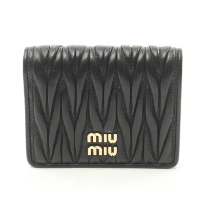 Miu Miu Matelasse Matelasse Bi-fold Wallet Leather In Black