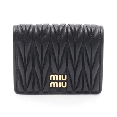Miu Miu Matelasse Miu Leather Wallet In Black