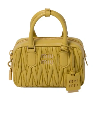 Miu Miu Logo-plaque Matelassé Leather Mini Bag In Brown