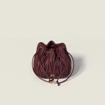 Miu Miu Matelassé Nappa Leather Pouch In Burgundy