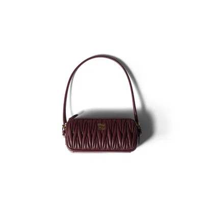 Miu Miu Matelassé Nappa Leather Pouch In Burgundy