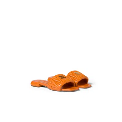 Miu Miu Matelassé Nappa Leather Slides In Orange
