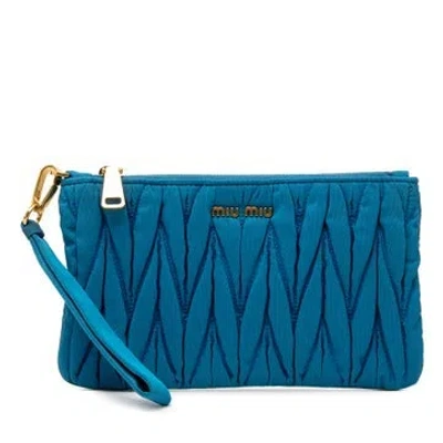 Pre-owned Miu Miu Matelasse Nylon Clutch In Blue