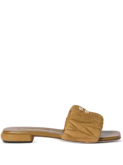 MIU MIU MATELASSÉ SUEDE SLIDES
