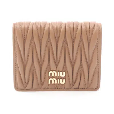 Miu Miu Matelasse Wallet In Brown