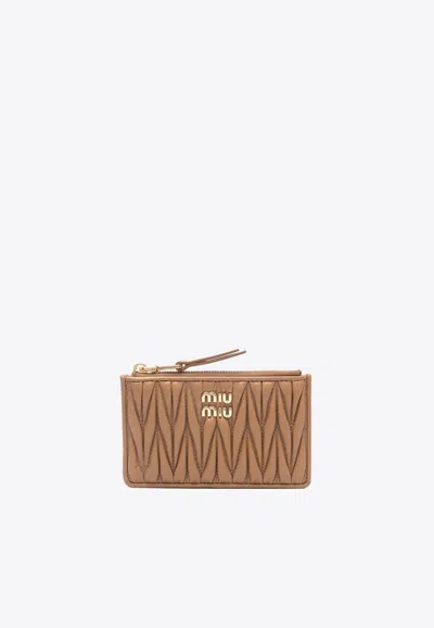 Miu Miu Matelassé Zipped Leather Wallet In Caramel