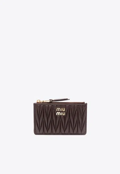 Miu Miu Matelassé Nappa Leather Pouch Wallet In Chocolate
