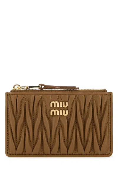 Miu Miu Matelassé Zipped Wallet In Brown