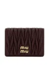 Miu Miu Women Matelassã© Leather Wallet With Metal Logo In Brown