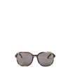 Miu Miu Miu Regard Sunglasses In Gray