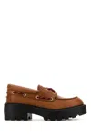 Miu Miu Lug Sole Boat Shoe In Cognac