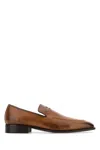 Miu Miu Embossed Logo Leather Mocassin Loafers In Brown