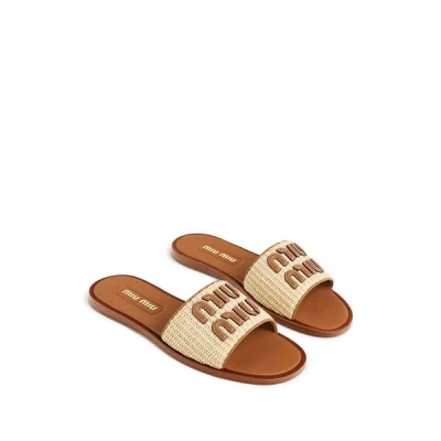Miu Miu Mules En Tissu Effet Raphia In Beige