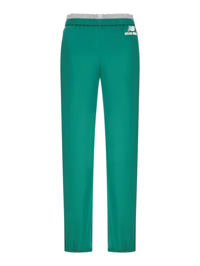 Miu Miu New Balance X  Technical Poplin Trousers Featuring Coco Gauff In Green