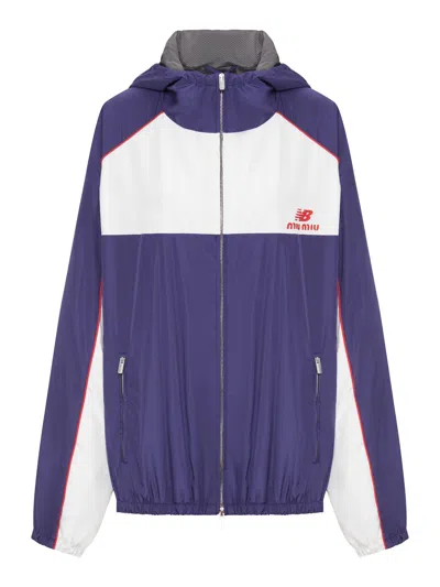 Miu Miu New Balance X  Technical Poplin Windbreaker Featuring Coco Gauff In Blue