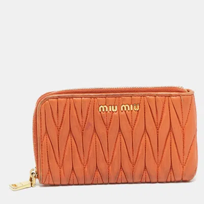 Pre-owned Miu Miu Orange Matelassé Leather Zip Around Purse