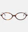 Miu Miu Oval Glasses In Brown