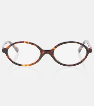 Miu Miu Oval Glasses In Brown