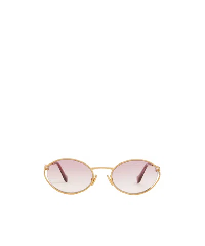 Miu Miu Oval Metal Frame Sunglasses In Gold