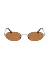 Miu Miu Oval Sunglasses In Brown